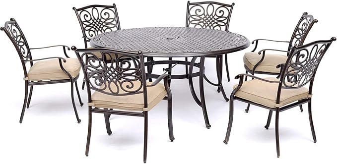 Hanover Traditions 7-Piece Outdoor Dining Set in Tan with Six Dining Chairs, Cushions and a 60 In. Round Cast-top Table, UV and Weather-Resistant, All-Weather Patio Dining Set for 6