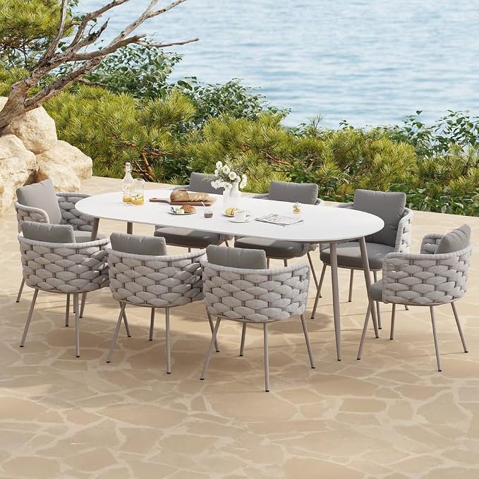 9-Piece Outdoor Dining Set with 84'' Oval Sintered Stone Top, Rope Woven Armchairs, Aluminum Frame, Cushions for Patio and Garden Dining