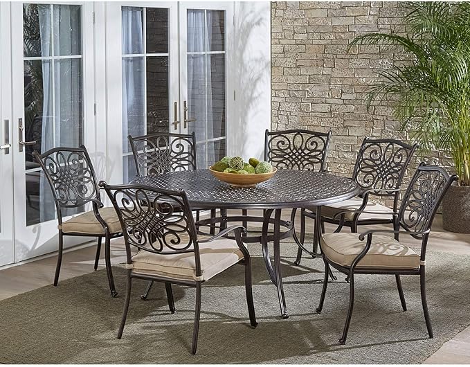 Hanover Traditions 7-Piece Outdoor Dining Set in Tan with Six Dining Chairs, Cushions and a 60 In. Round Cast-top Table, UV and Weather-Resistant, All-Weather Patio Dining Set for 6
