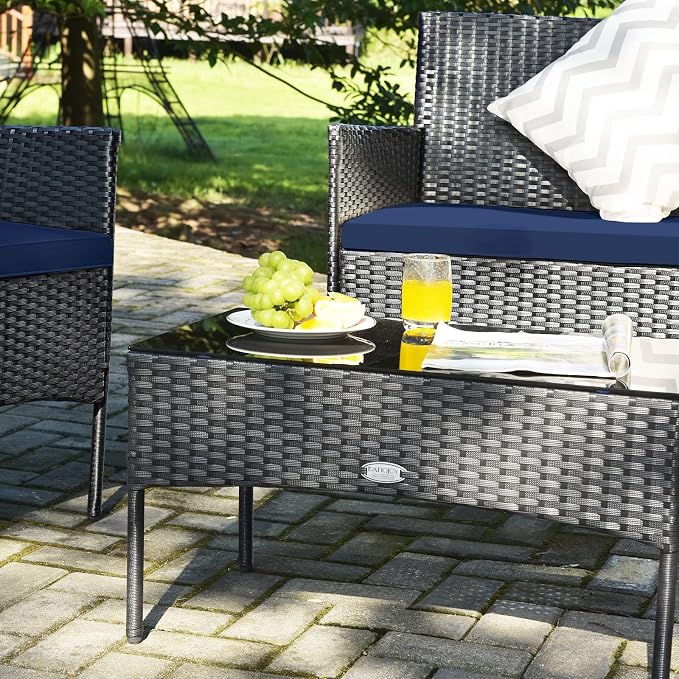 Tangkula 8 Pieces Patio Furniture Set, Outdoor Wicker Conversation Set with Tempered Glass Tabletop, Rattan Sofa and Chairs Set with Off White & Navy Cushion Covers